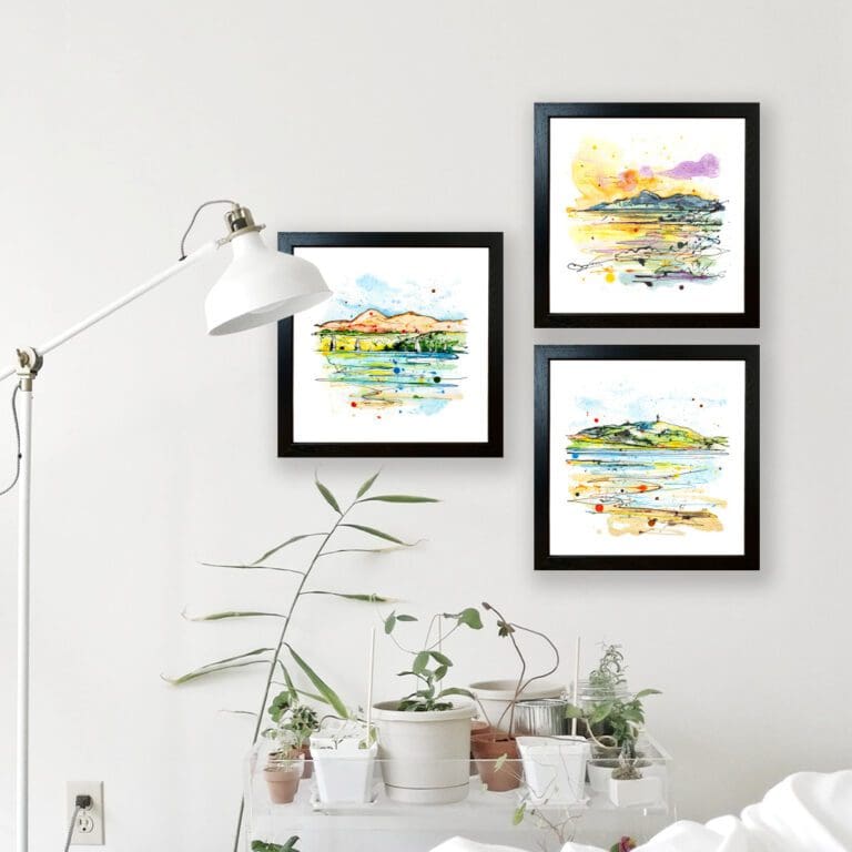 The Mournes at Sunset, Scrabo from the Lough, and Set Sail, Strangford Lough, three Kathryn Callaghan prints, shown in Standard Black Frames in Situ