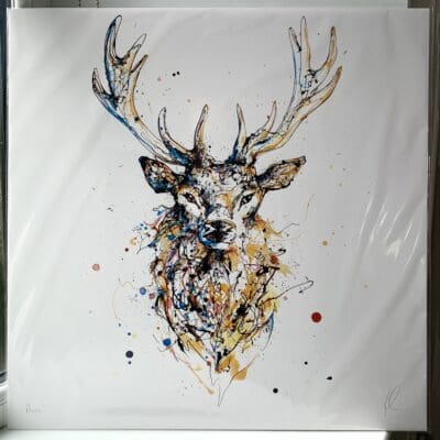 An extra large 60x60cm print of Aura by Kathryn Callaghan, which features a golden brown coloured stag bust staring inspiringly at the viewer.