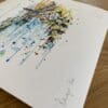 Photograph of Bangor Pier by Kathryn Callaghan, which shows the print's title handwritten in the bottom left corner and the artist's signature in the bottom right, with space between to add a custom personalisation.