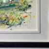 A close up of an original landscape painting by Kathryn Callaghan, showing the double wood frame and artist's signature.