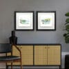 30x30cm prints of Strangford Village and Bangor Pier by Kathryn Callaghan, both shown in deluxe black frames, in situ.