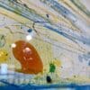 A close up showing the texture surface of an original painting of West Strand Portrush by Kathryn Callaghan.